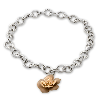 Link bracelet in 14K white gold with 14K rose gold rose charm from Ben Bridge .