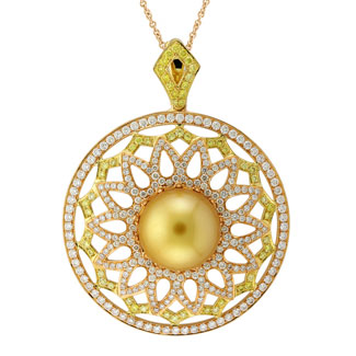 White and yellow diamonds set in 18kt gold with a pearl center from Yael Designs