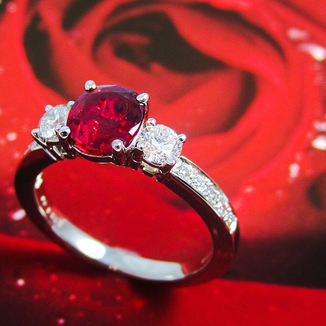 A stunning ruby and diamond ring by Suna Bros.