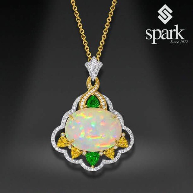 Yellow gold and Opal pendant from Spark Creations.