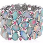 The Kalmia bracelet by Yael Designs features opal cabochons accented with pink spinel.
