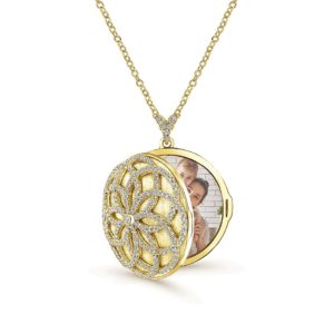 In this digital age, a classic locket is appreciated! Diamond and 14k gold locket, by Gabriel & Co.
