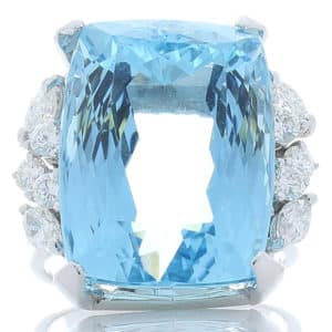 A 30.63 ct aquamarine ring flanked by diamonds, from Atlantic Diamond Company.