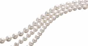 Chains of white pearls forming an ornament