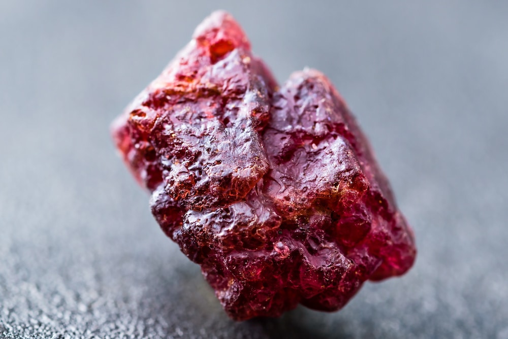 Uncut and rough natural red spinel crystal.