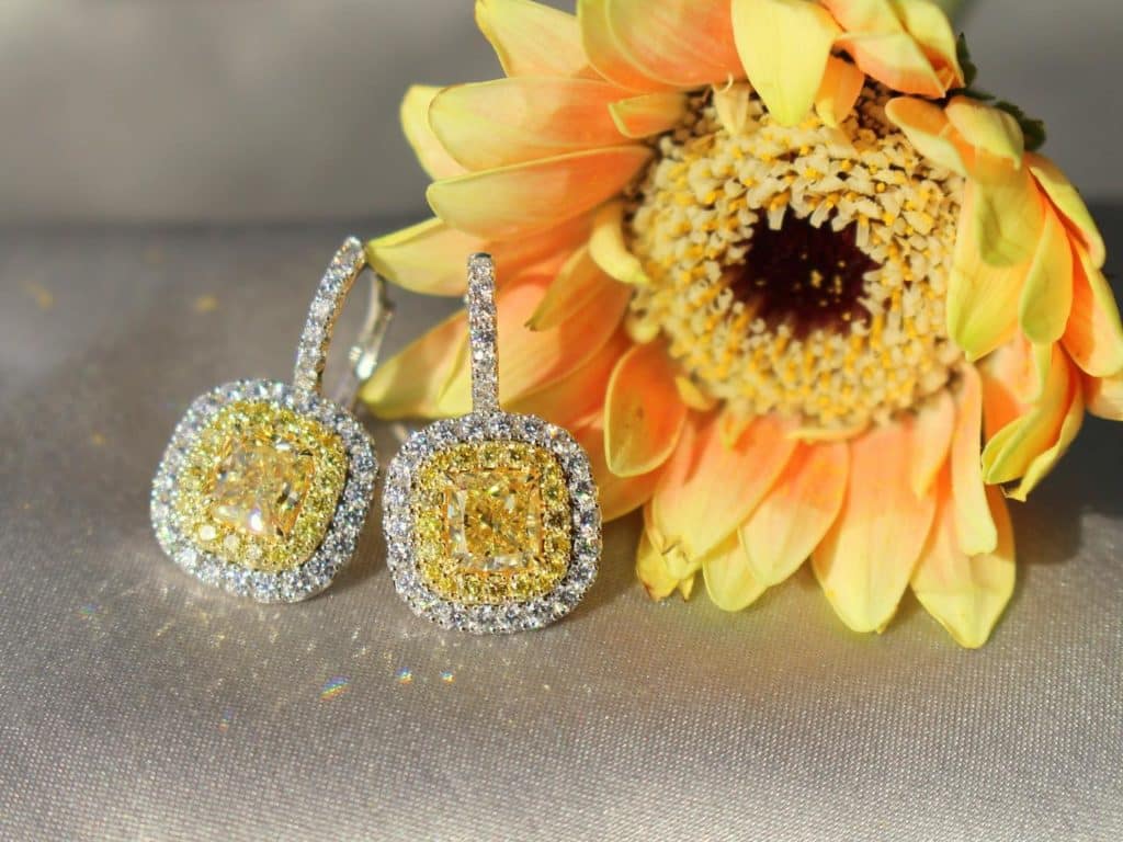 Fancy color diamond earrings by Pompos Jewelry