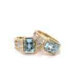 Emerald cuts are popular! Here are two gorgeous aquamarine and diamond rings.
