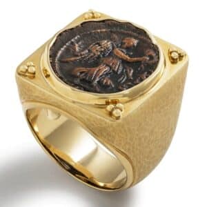 Gold statement ring by Jorge Adler.